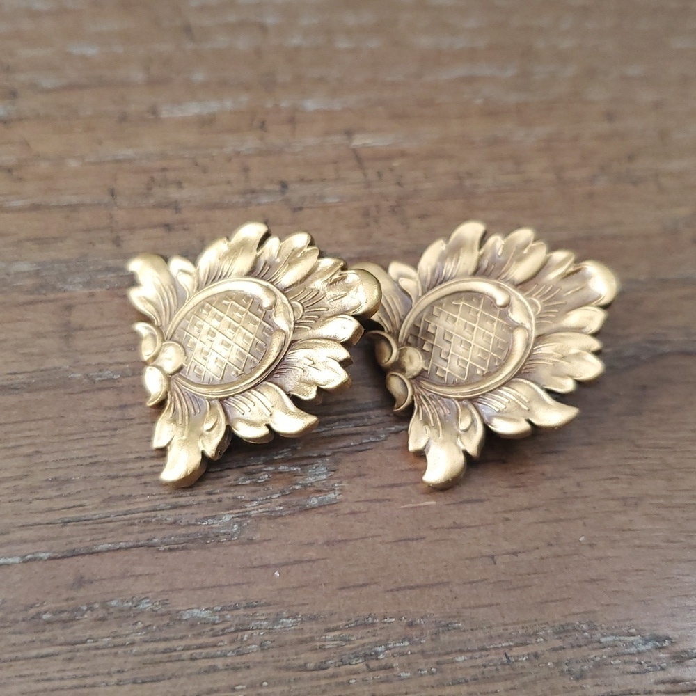 MFA gold tone clip on Museum of Fine Arts earrings.